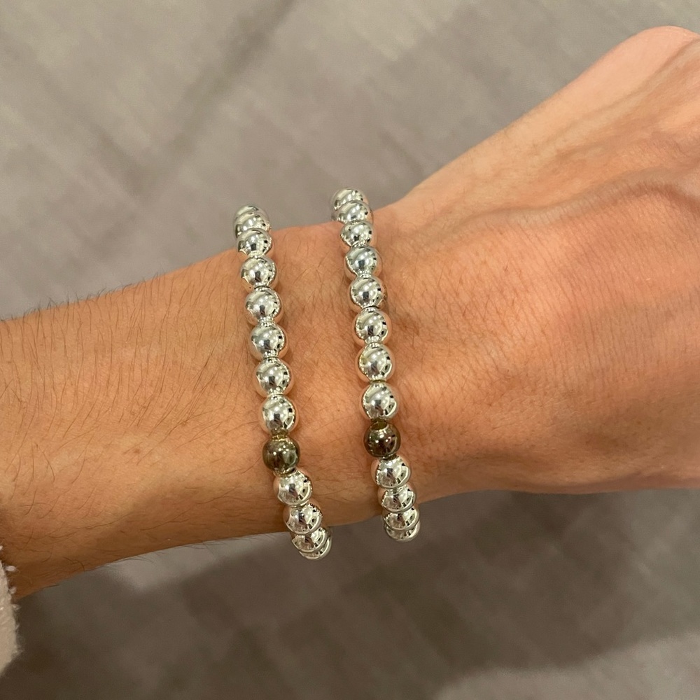 Gorgeous set of silver bracelets. Extremely durable.